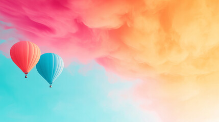 Fototapeta premium Two hot air balloons floating in a colorful sky with pink orange and blue hues creating a dreamlike scene