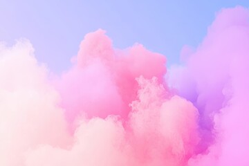 Fototapeta premium 青空を背景にピンクや紫の雲が立ち昇り、夢のような景色を作り出している。