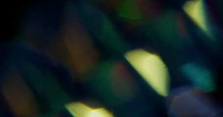 Beam leak. Blur iridescent texture. Defocused yellow green colorful rainbow spectrum light flare on...
