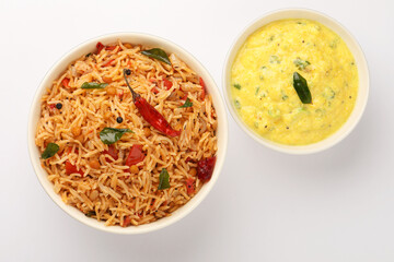 South Indian food Tomato Rice served in a ceramic bowl 