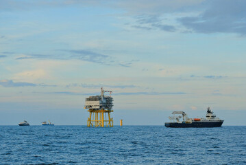 Offshore Substation Platform with Multiple Support Vessels In DP Mode at Noirmoutier Wind Farm...