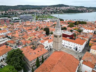 view of koper bell tower with red roofs in slovenian town (slovenia mediterranean coast) adriatic...