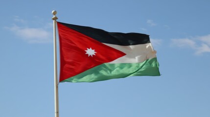 Jordanian flag waving on a clear blue sky day