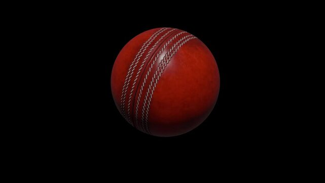 3D cricket ball is slowly rolling on the spot. A shiny red cricket ball in a continuous loop roll is perfect for sports advertising. 4K clip smooth motion isolated on black background.