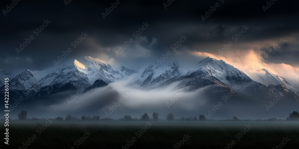 Aufkleber The mountains are covered in snow and the sky is dark and cloudy. The mountains are in the background and the clouds are in the foreground