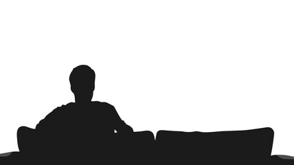 Lonely man sitting in silence on couch in silhouette

