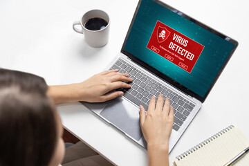 Virus warning alert on computer screen detected brisk cyber threat , hacker, computer virus and...