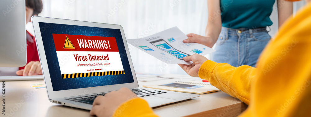Poster virus warning alert on computer screen detected brisk cyber threat , hacker, computer virus and malw