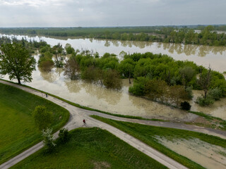 Aerial view capturing the flooded Po River in Emilia Romagna, Italy, with submerged trees and...