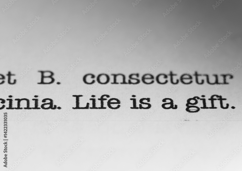 Fototapete life is a gift. text printed on a page. a piece of paper with a phrase written in retro typewriter f