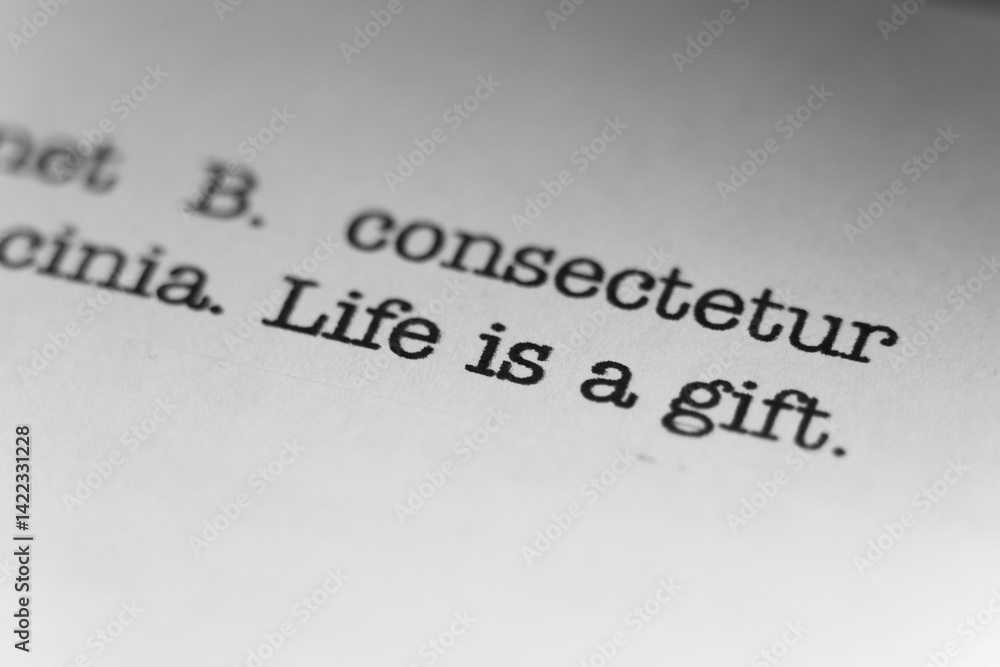 Fototapete life is a gift. text printed on a page. a piece of paper with a phrase written in retro typewriter f