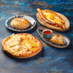 Khachapuri with cheese, savory open or closed pie with cheese and egg, traditional Georgian dish from the Caucasus region