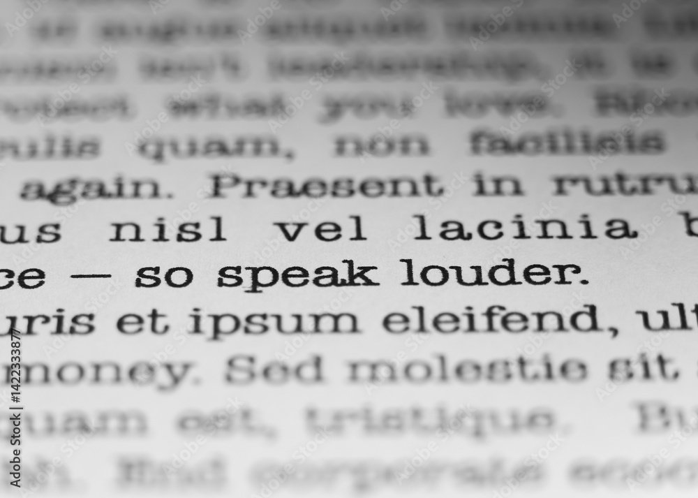 Fototapete speak louder. encouraging text printed on a page. a piece of paper with a phrase written in retro ty