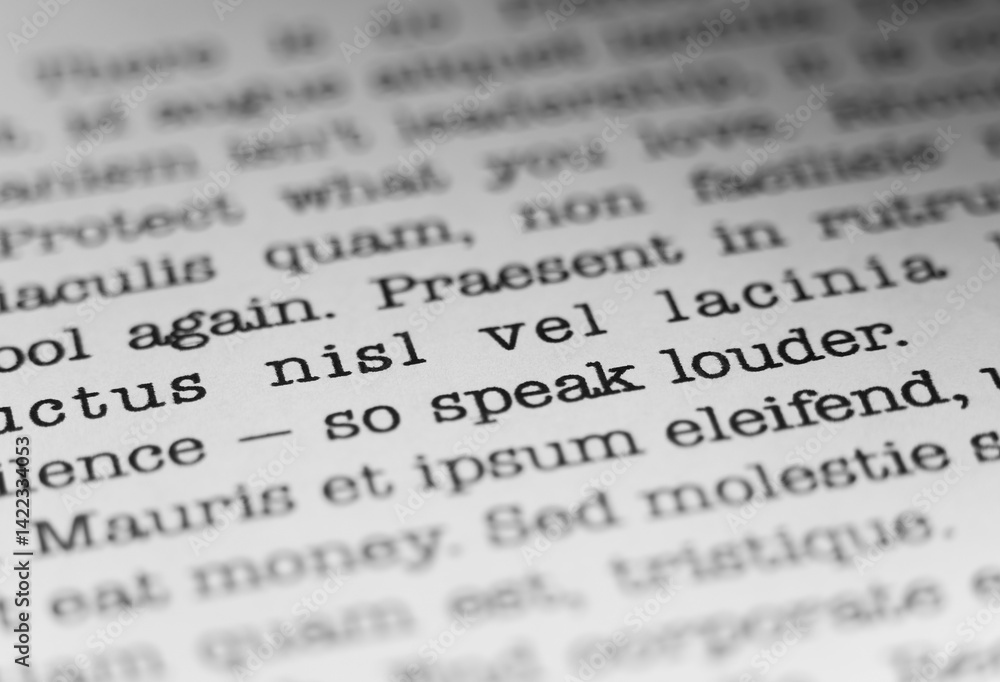 Fototapete speak louder. encouraging text printed on a page. a piece of paper with a phrase written in retro ty