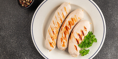 White sausage grill Bockwurst pork meat Bratwurst food dish organic product fresh tasty gourmet food background on the table rustic food top view copy space
