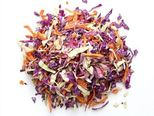 Obraz premium Vibrant shredded cabbage and carrot mix on a white background offering a fresh and colorful culinary ingredient suitable for salad or slaw preparation