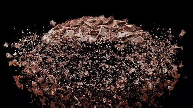 Explosion of chocolate cake with frosting flying everywhere showcasing messy and fun dessert mishap.