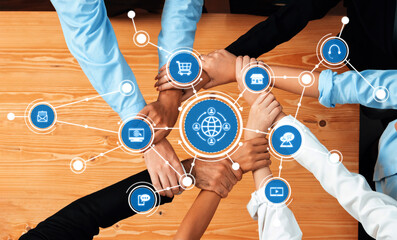 This image illustrates hands uniting around a globe, symbolizing collaboration and global connectivity. Various technology icons represent diverse networking possibilities in business. Amity