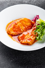 Fish fillet tomato sauce white fish dish organic fresh tasty gourmet food background on the table rustic food top view copy space 