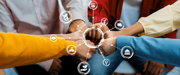 Dynamic collaboration concept showcasing diverse hands uniting with digital icons, representing...
