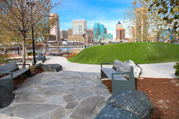 Walking paths on the Baltimore waterfront in the Inner Harbor area. Landscape design, benches and seating areas.
