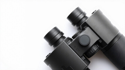 Sleek black binoculars with textured grips and adjustable focus wheel isolated on a white background.