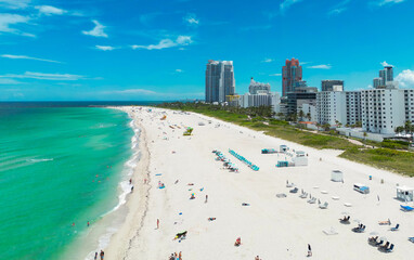 Miami cityscape with luxury skyscrapers and ocean. Panoramic drone view of Miamis famous skyline....