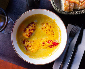 Stuffed piquillo peppers with cod brandade in sauce