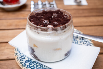 Tiramisu in a jar in close-up