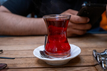 turkish cup of tea with teapot	