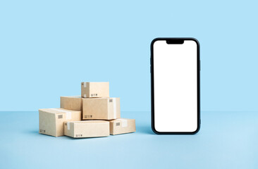 smartphone mockup with a blank screen next to stacked delivery boxes on a blue background.