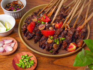 Sate Kambing – Traditional Indonesian Grilled Lamb Satay with Sambal Kecap and Fresh Condiments
