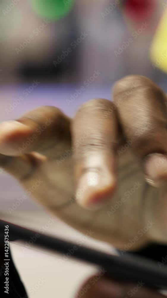 Poster vertical video close up of engineer using tablet to design solar panels factory layouts, utilizing c