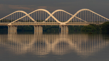 bridge over the river at sunset