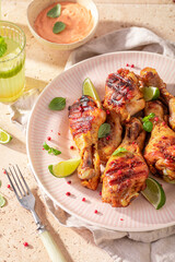 Hot grilled chicken leg as a summer dinner.