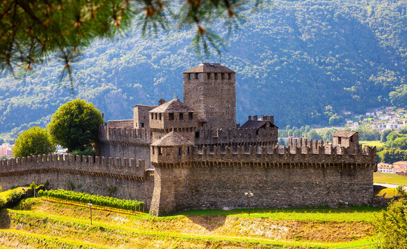 Picturesque summer view of medieval fortified Montebello Castle protecting old city of Bellinzona on foothills of Swiss Alps