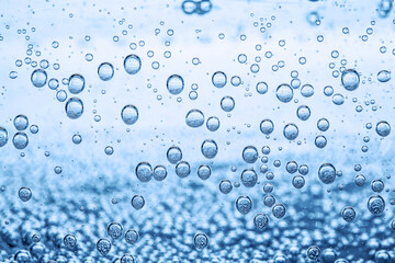 Refreshing soda water as background, closeup view