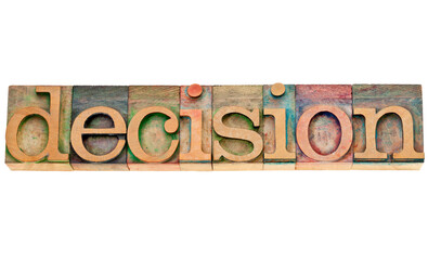 decision  - isolated word in vintage letterpress wood type stained by color inks