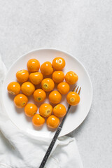 Overhead view of golden gooseberries, top view of Peruvian groundcherry