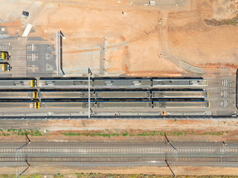 Aerial view of metro trains lined up at a railway depot