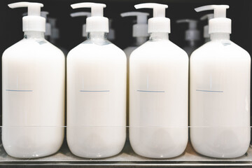 Refill to reduce plastic waste. soap or shampoo for refill. plastic bottles for refill liquid soap, shampoo and other products. Zero waste. Reuse reduce recycle concept. Copy space.