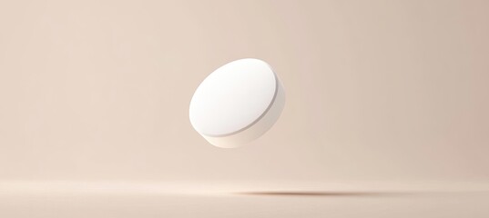 White round object levitating over beige background.
