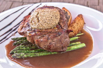 Fillet Rossini, Tournedos Rossini with foie gras, asparagus, and fries. Filet mignon. Served in the restaurant. Lunch