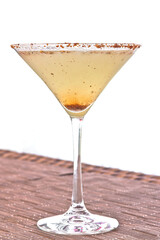 Chili Martini. Cocktail with vodka and dried chili powder in a martini glass.