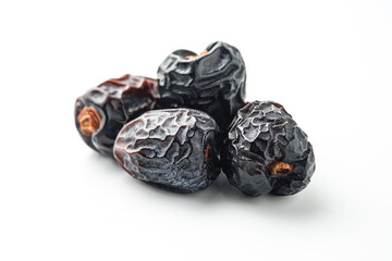 Dates fruit ajwa or kurma ajwa, isolated on white background