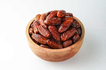 Dates fruit tunisia, Tunisian honey dates, in bowl isolated on white background
