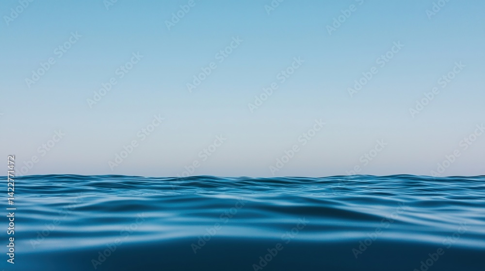 Poster serene ocean view with gentle waves under a clear blue sky, creating a peaceful and calming atmosphe
