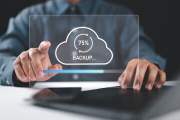 Backup concept, Businessman hand touching backup icon on virtual screen. Online digital data...