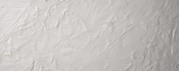 Obraz premium A heavily creased, worn white poster; visible paper fibers , paper texture, damaged, creased