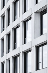 Obraz premium Modern Concrete Building Facade with Windows